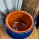 Casserole, enamelled refractory clay pot.