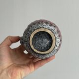 Small textured ceramic pitcher or vase