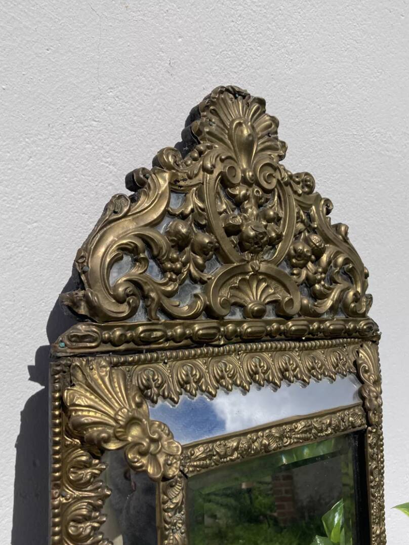 Golden mirror with 19th century embossed brass beads