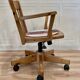 Fauteuil pivotant et inclinable bois massif.