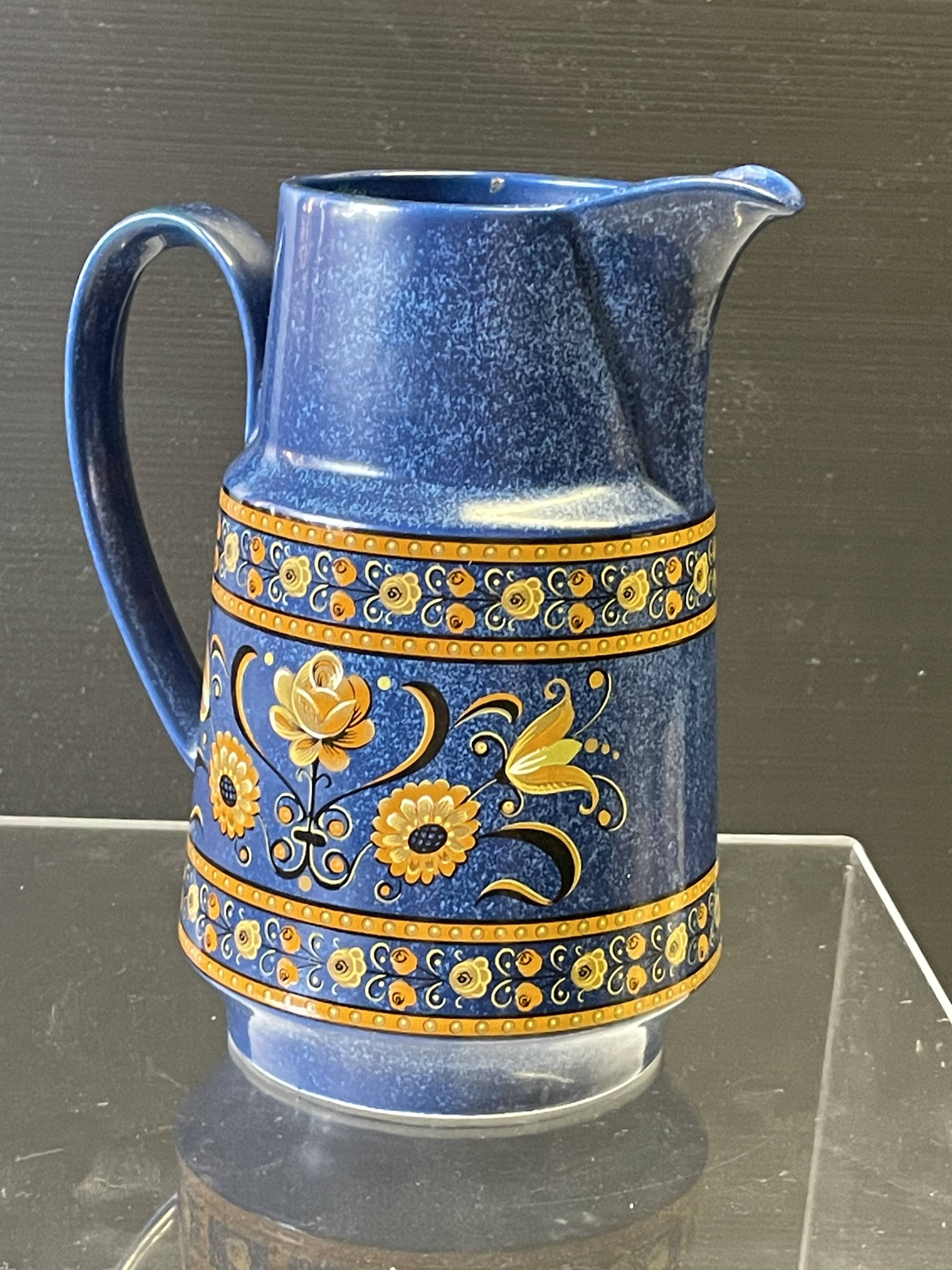 Very nice blue ceramic jug in good condition.
