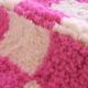 Tapis à damiers roses
