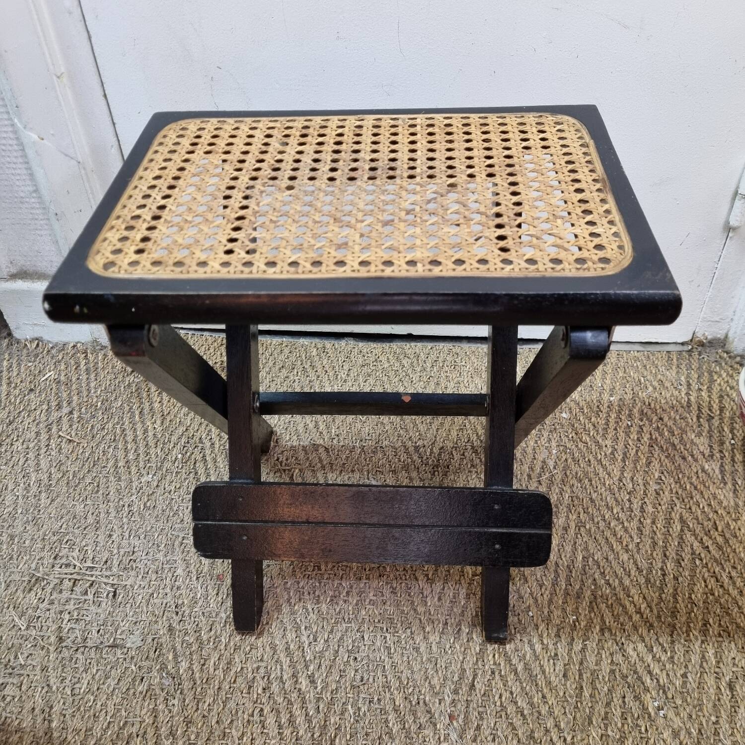 Cannage rattan footrest stool from 1970
