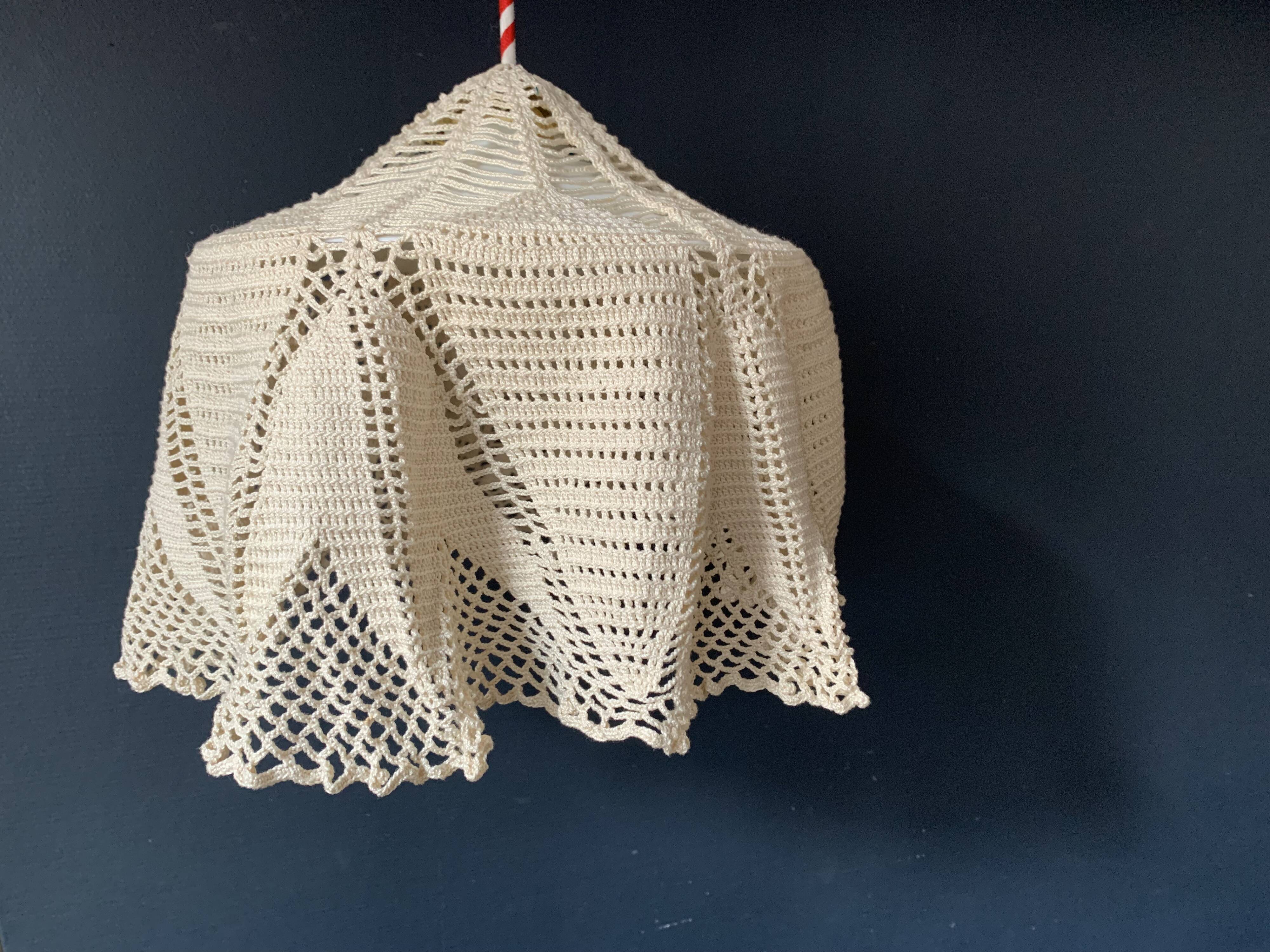 White opaline pendant light and handmade antique crochet lampshade
