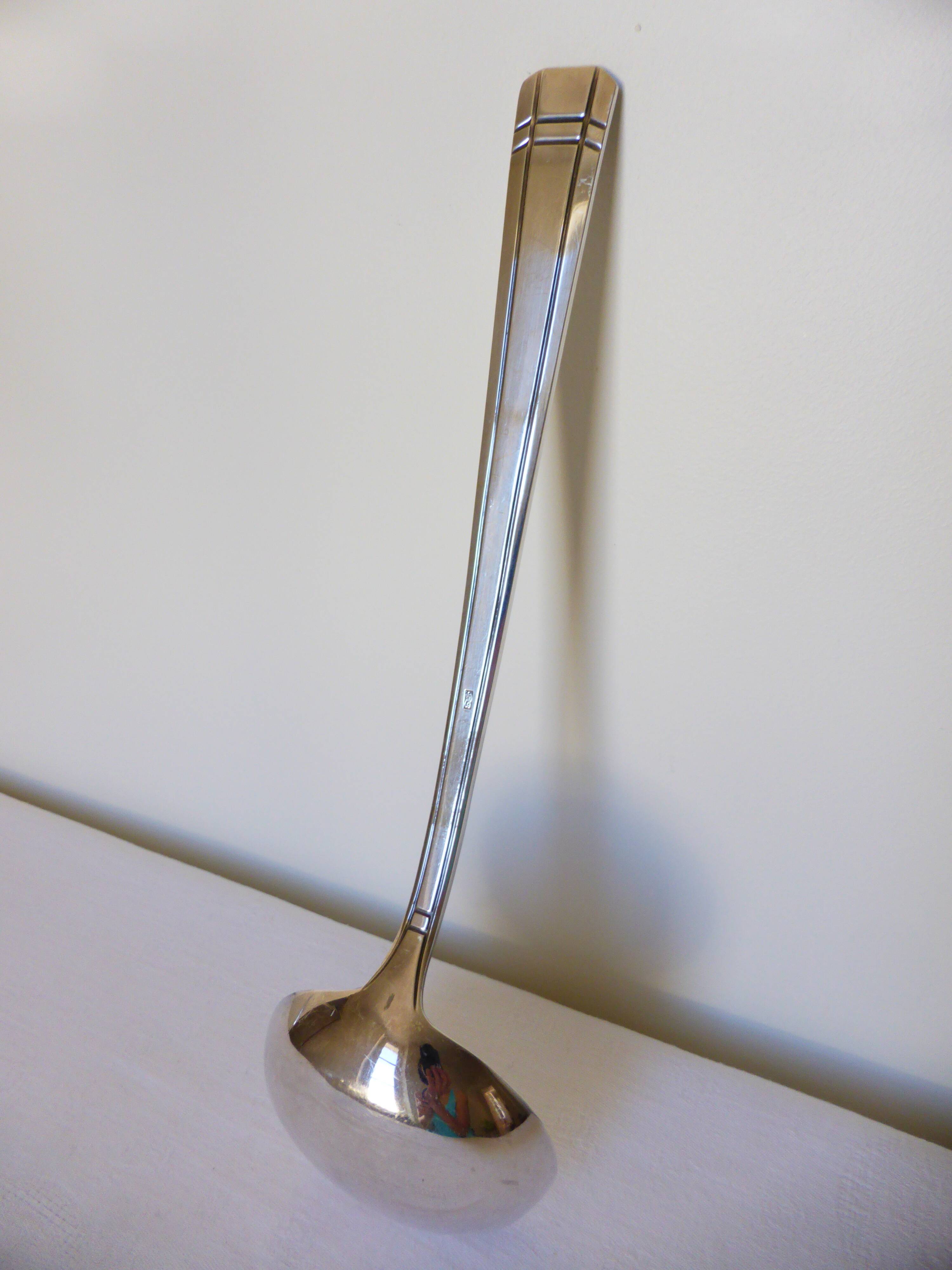Shabby vintage silver-plated ladle.