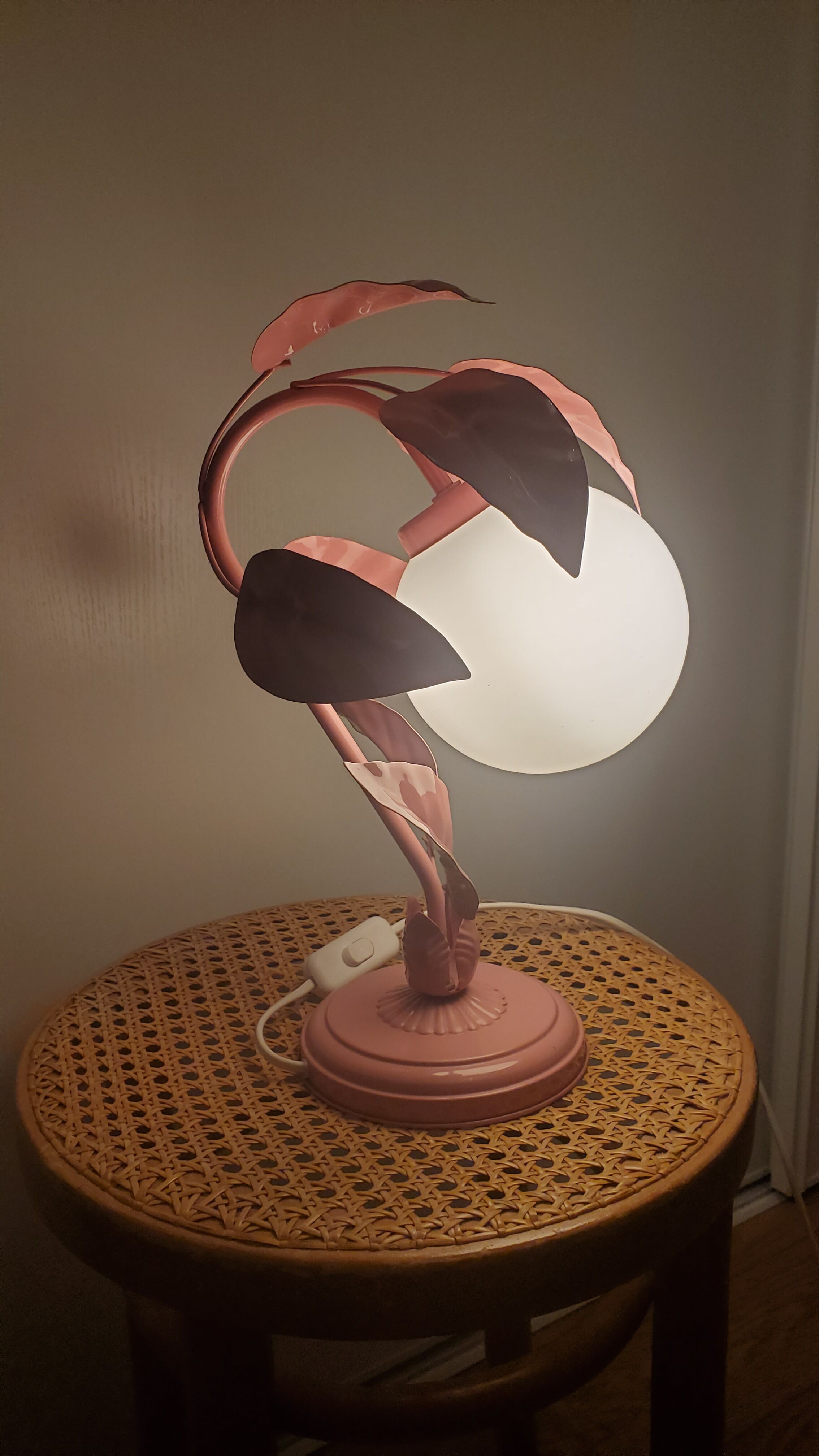 Opaline bedside lamp and pink leaves
