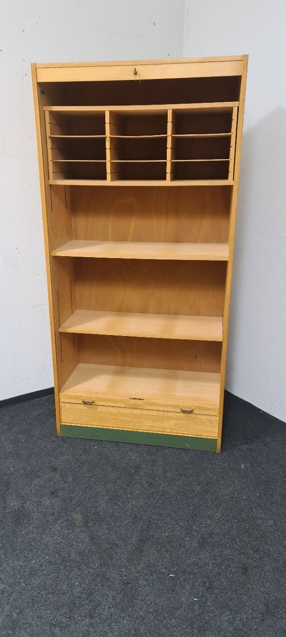 Vintage roll front cabinet by Wini