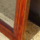 Large antique mirror in a flame mahogany frame; 132x82 cm