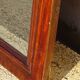 Large antique mirror in a flame mahogany frame; 132x82 cm