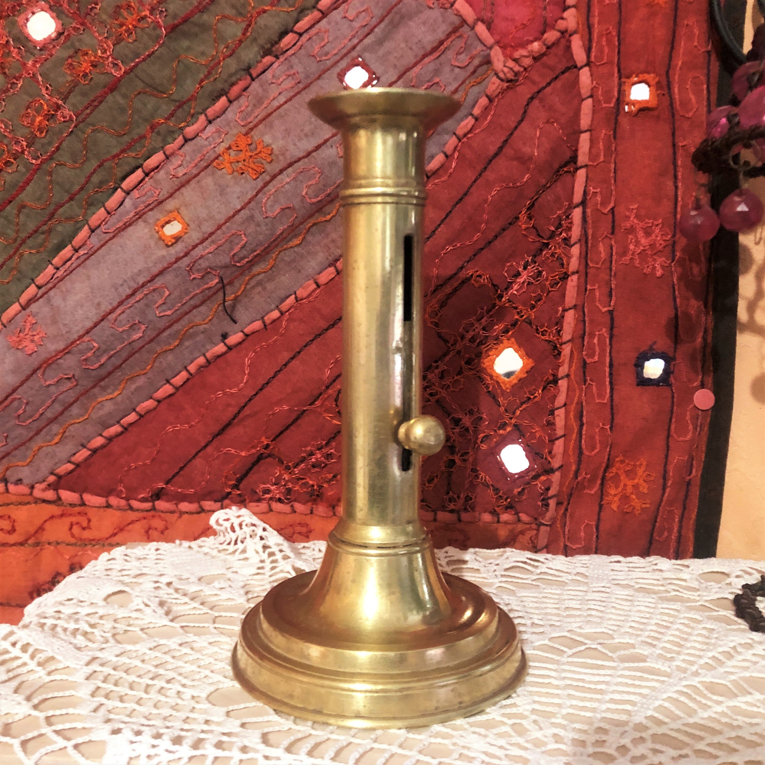 Old gold copper candle holder with pusher