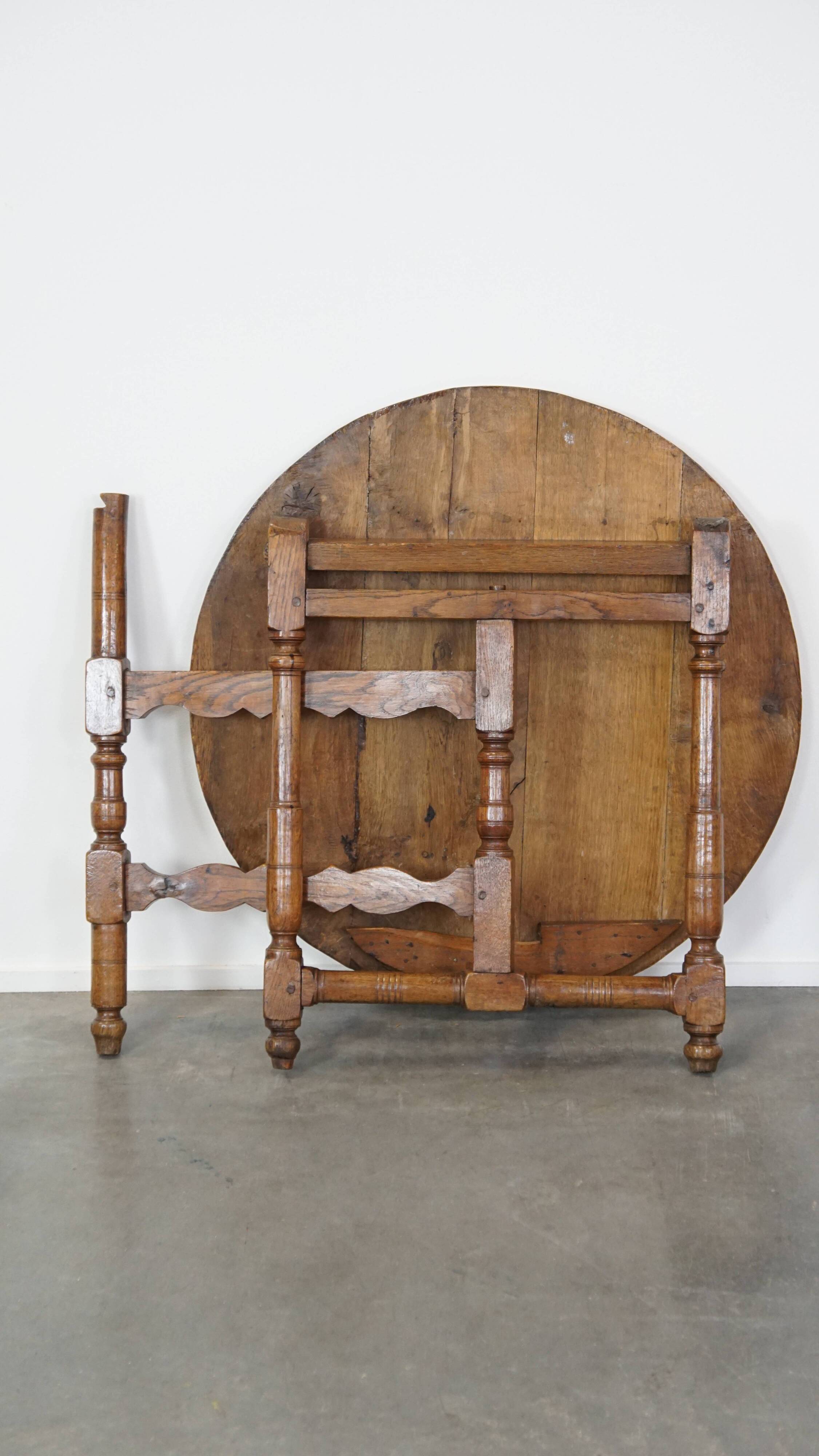Round, folding antique 18th-century French wine/country table