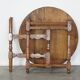 Round, folding antique 18th-century French wine/country table