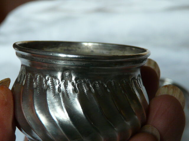 Pair of silver pepper shaker punch minerve