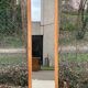 Art Deco mirror on a carved arched base, renovated in raw oak, 186cm