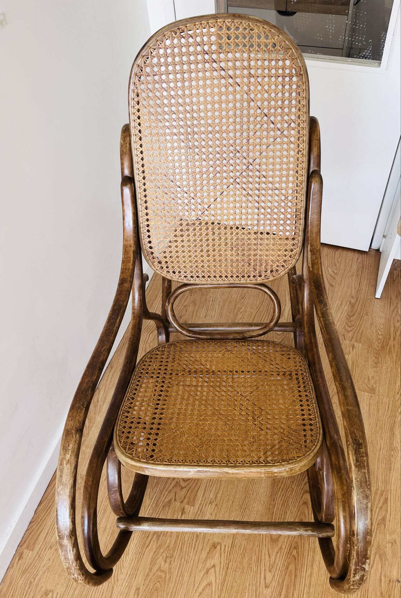 Antique Thonet bentwood rocking chair, original label.