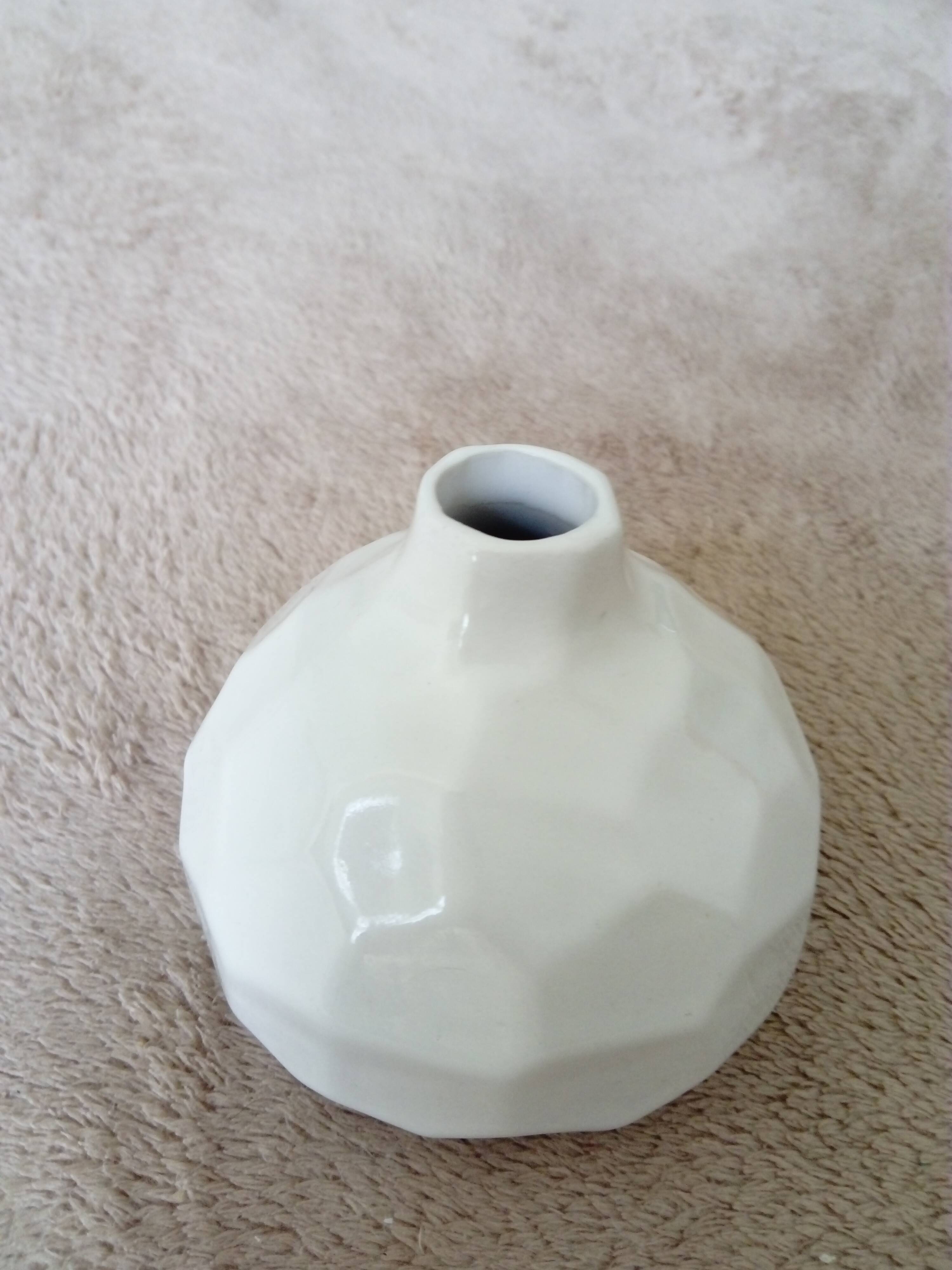 white ceramic faceted design vase