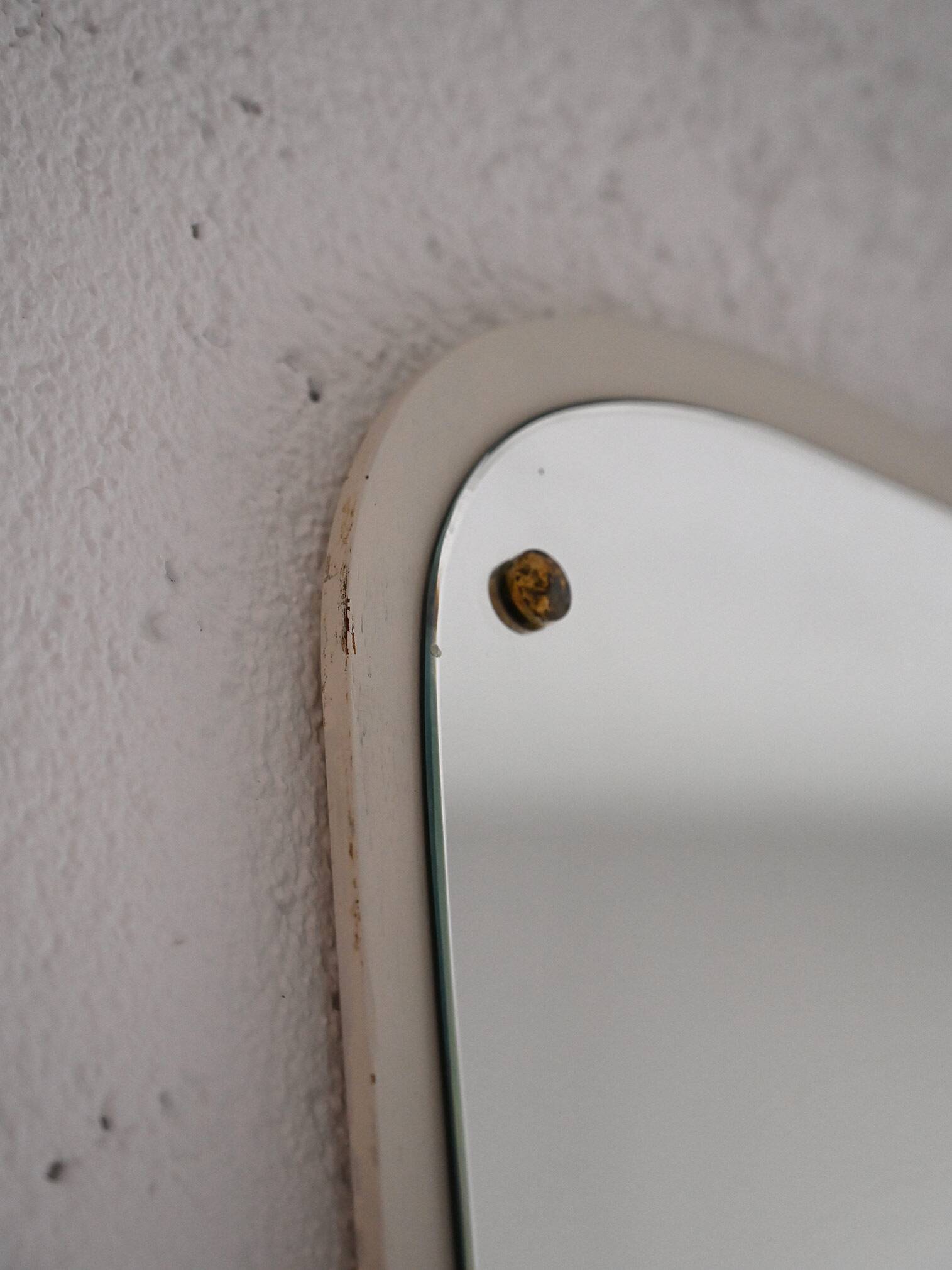 Decorative mirror with white painted wooden frame and gold details