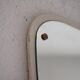 Decorative mirror with white painted wooden frame and gold details