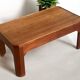 Teak coffee table with beveled legs, circa 1960