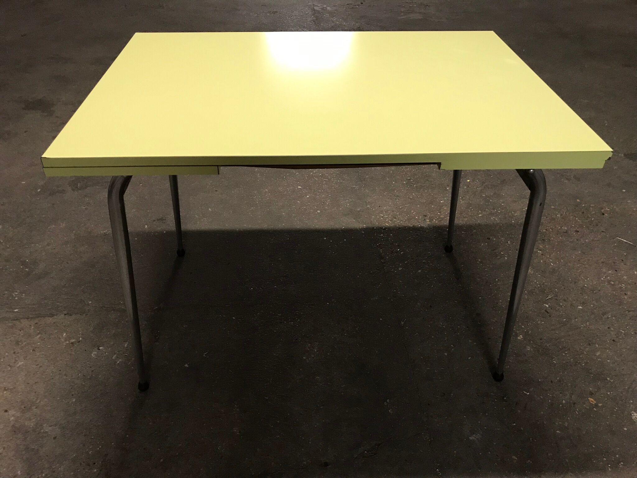 Yellow formica kitchen table with two extension cord, vintage 60s