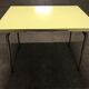 Yellow formica kitchen table with two extension cord, vintage 60s