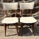 Pair of vintage chairs with upholstered backrest and seat, 1950s style.