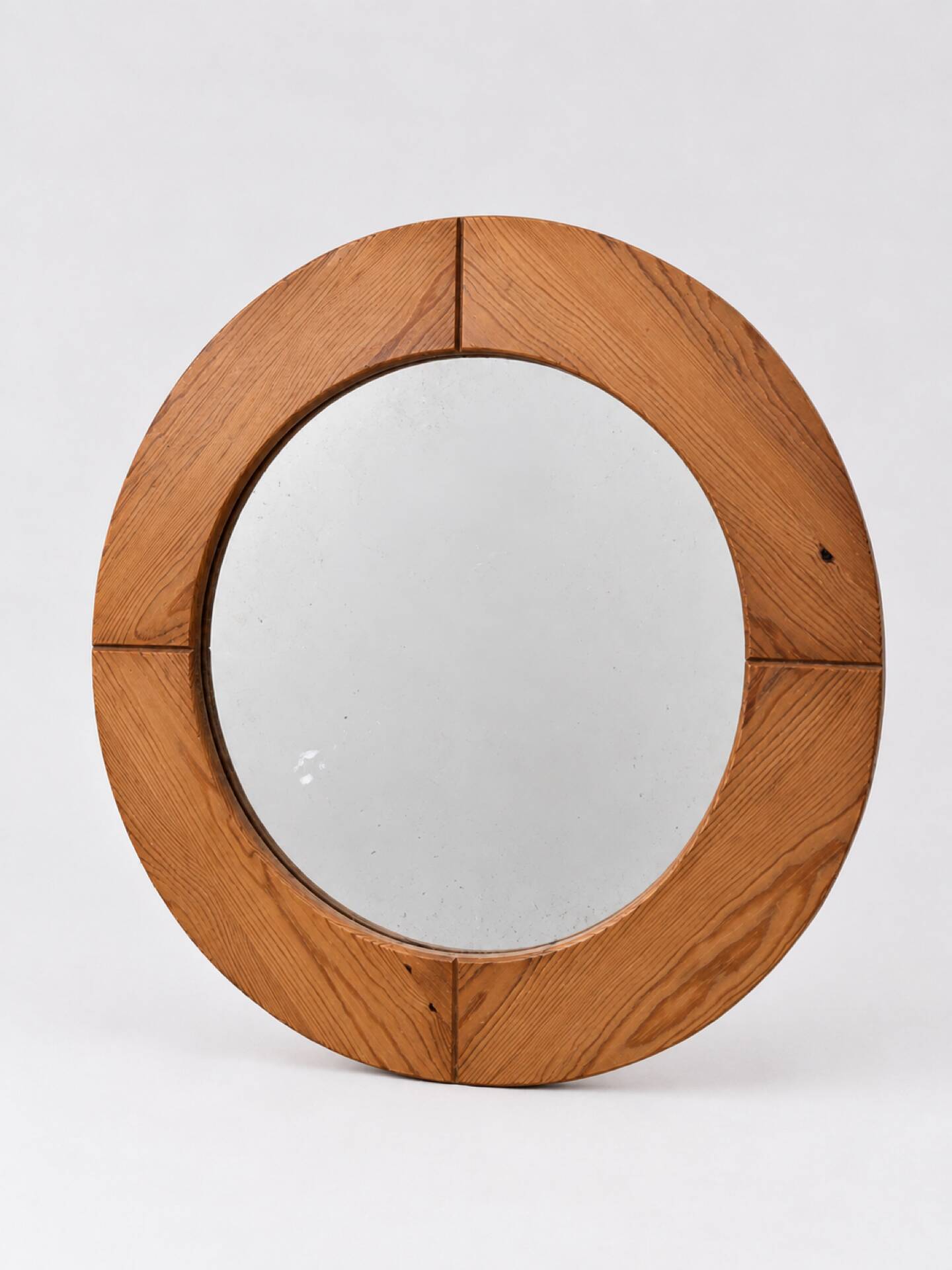 Round Scandinavian pine mirror from the 1970s.