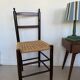 Chaise vintage en bois et paille tressée