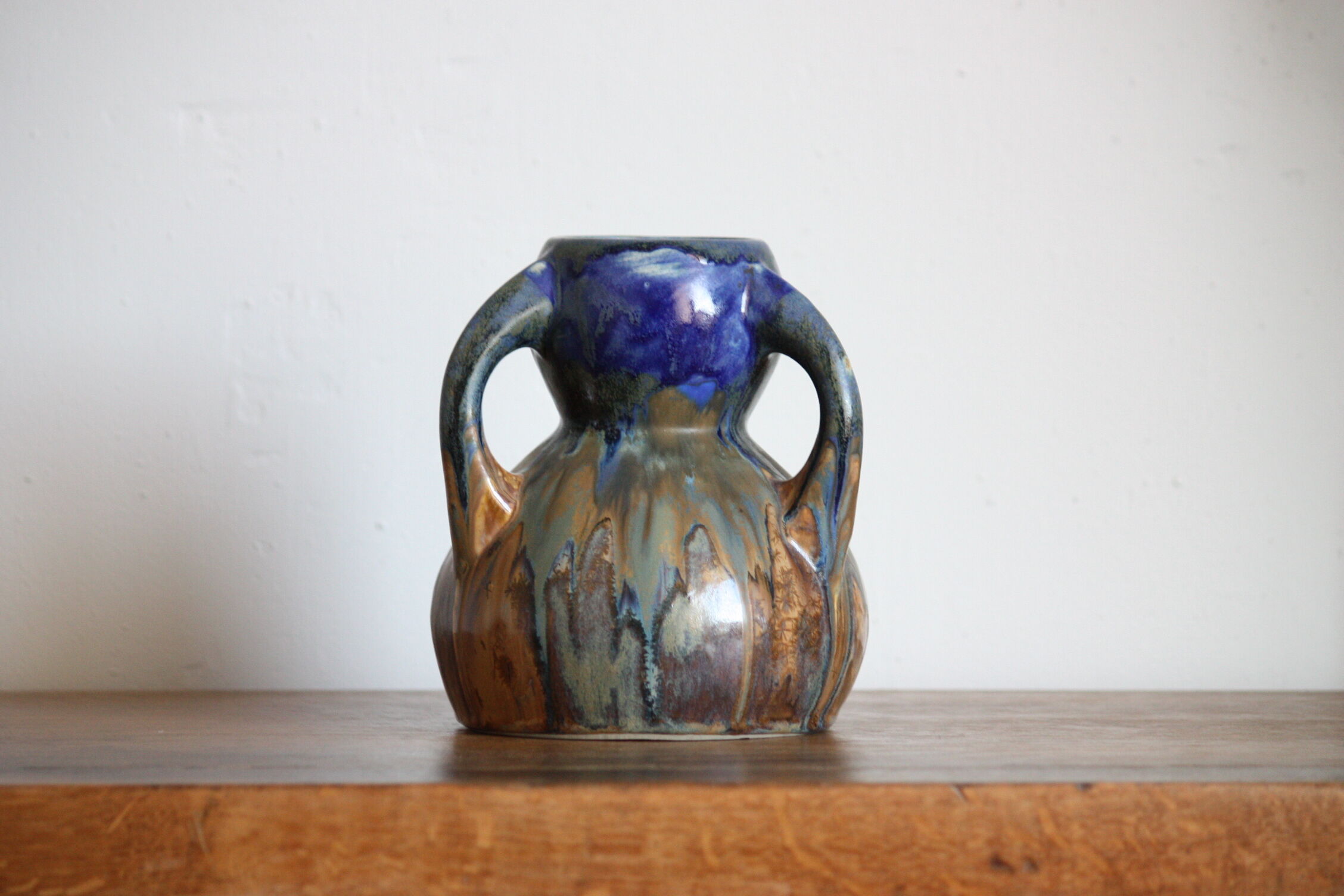 Blue vase in flaming sandstone