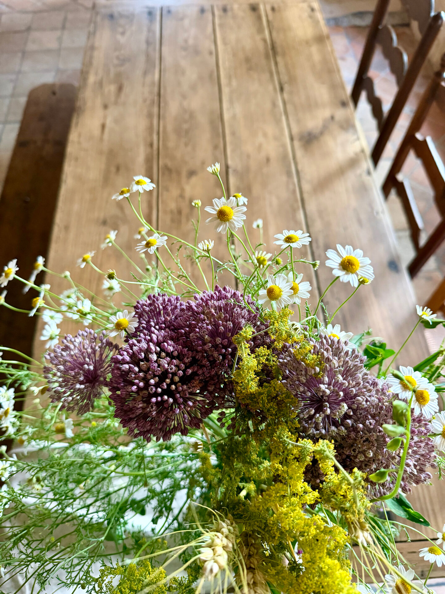 Renovated raw wood farmhouse table