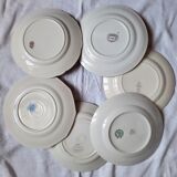 Flat antique earthenware plates with gilded edges
