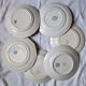 Flat antique earthenware plates with gilded edges