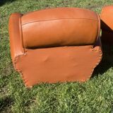 pair of leather clubs