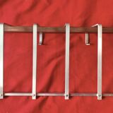 Vintage wall-mounted coat rack made of plywood and aluminum with hat rack