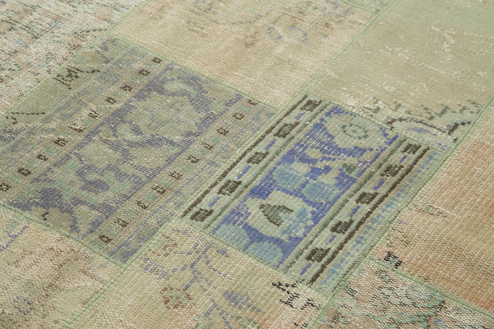Handwoven oriental overdyed 169 cm x 245 cm beige patchwork rug