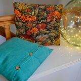 Scandinavian green cushion with wooden buttons