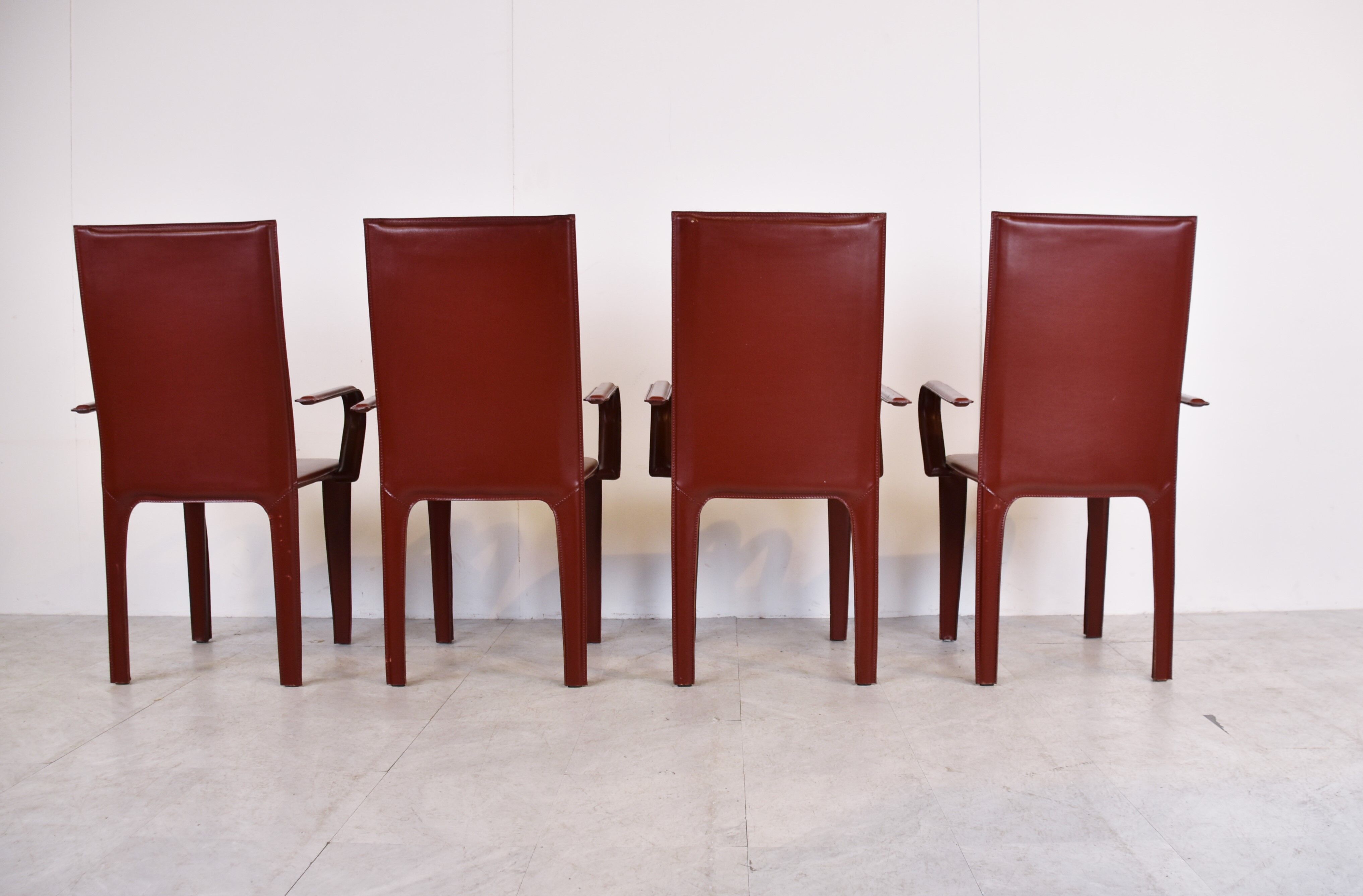 4 red leather dining chairs by Arper italy, 1980s