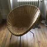 Antique round rattan armchair