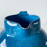 Old pitcher in glazed stoneware