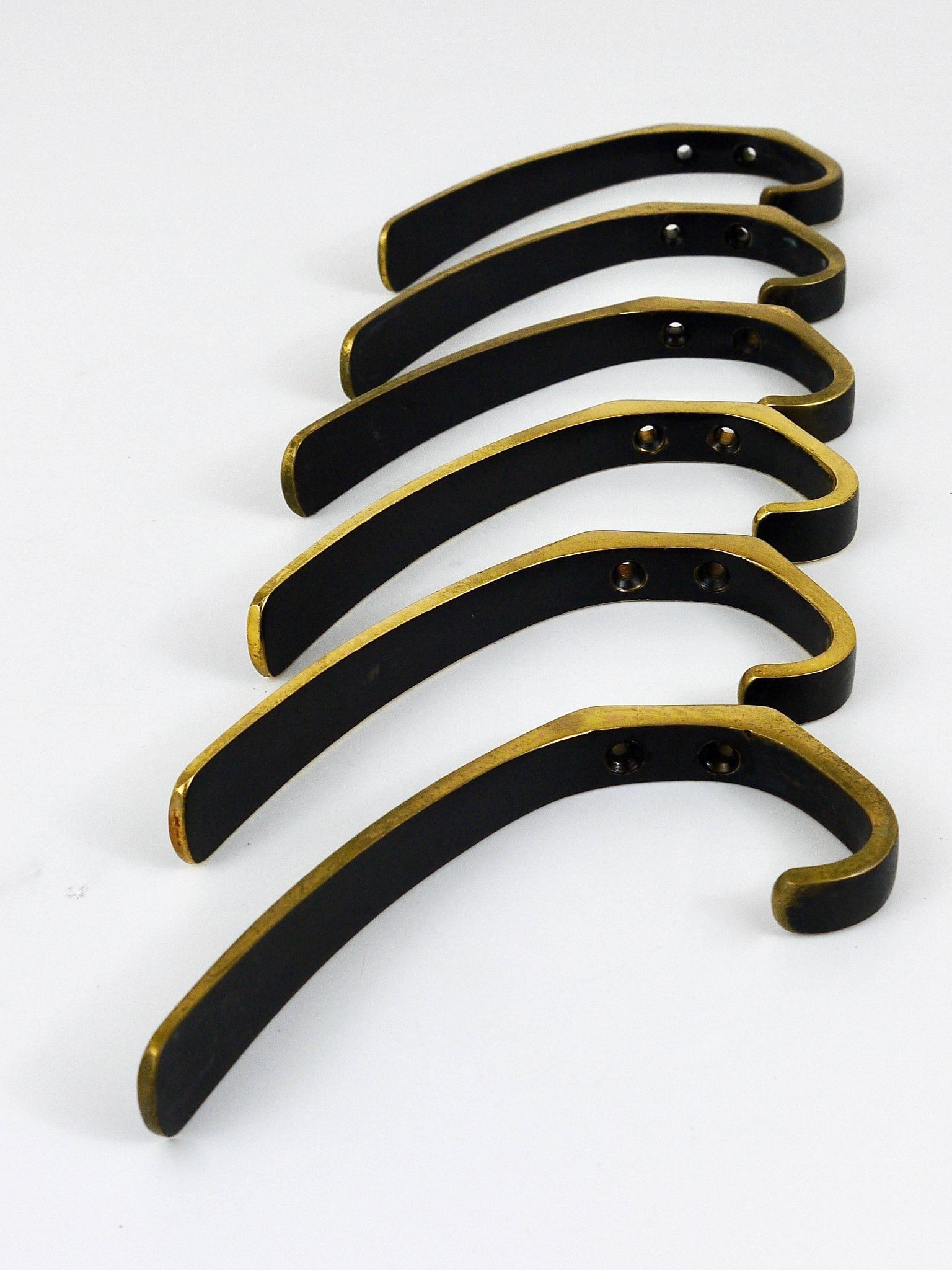 Up to 2 mid-century brass wall hooks by Hertha Baller, Austria, 1950s.