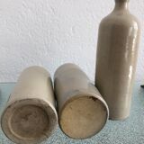 Trio of vintage stoneware bottles