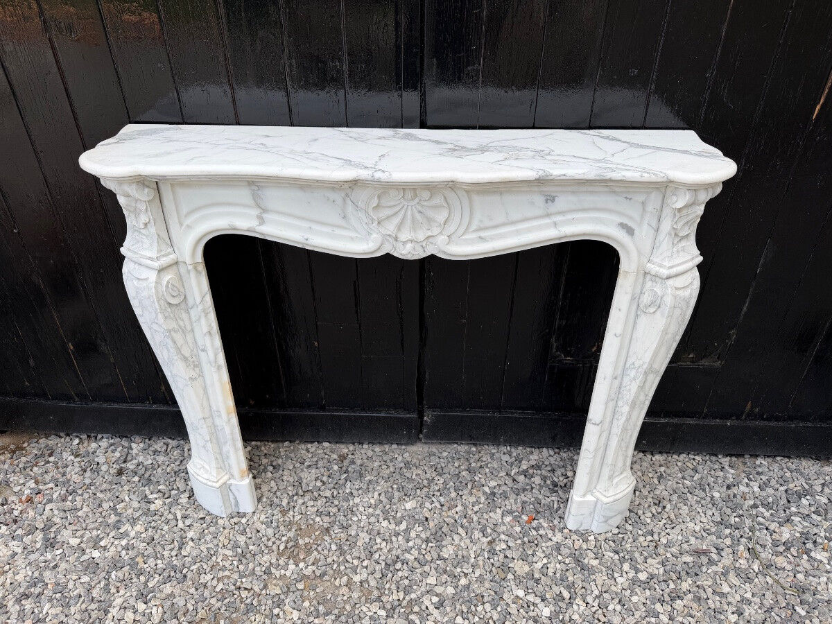 Louis XV style fireplace in Arabescato Carrara marble, circa 1880.