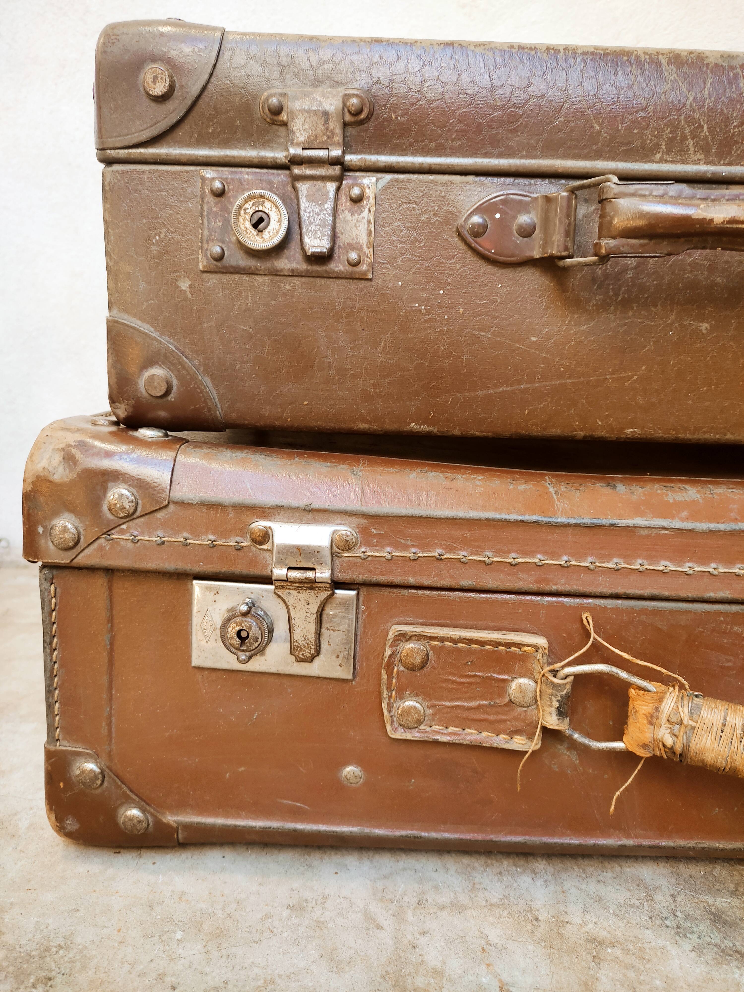 Duo of old suitcases