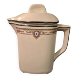 Old covered jug, vintage, geometric frieze with flowers and black trim.