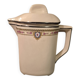 Old covered jug, vintage, geometric frieze with flowers and black trim.