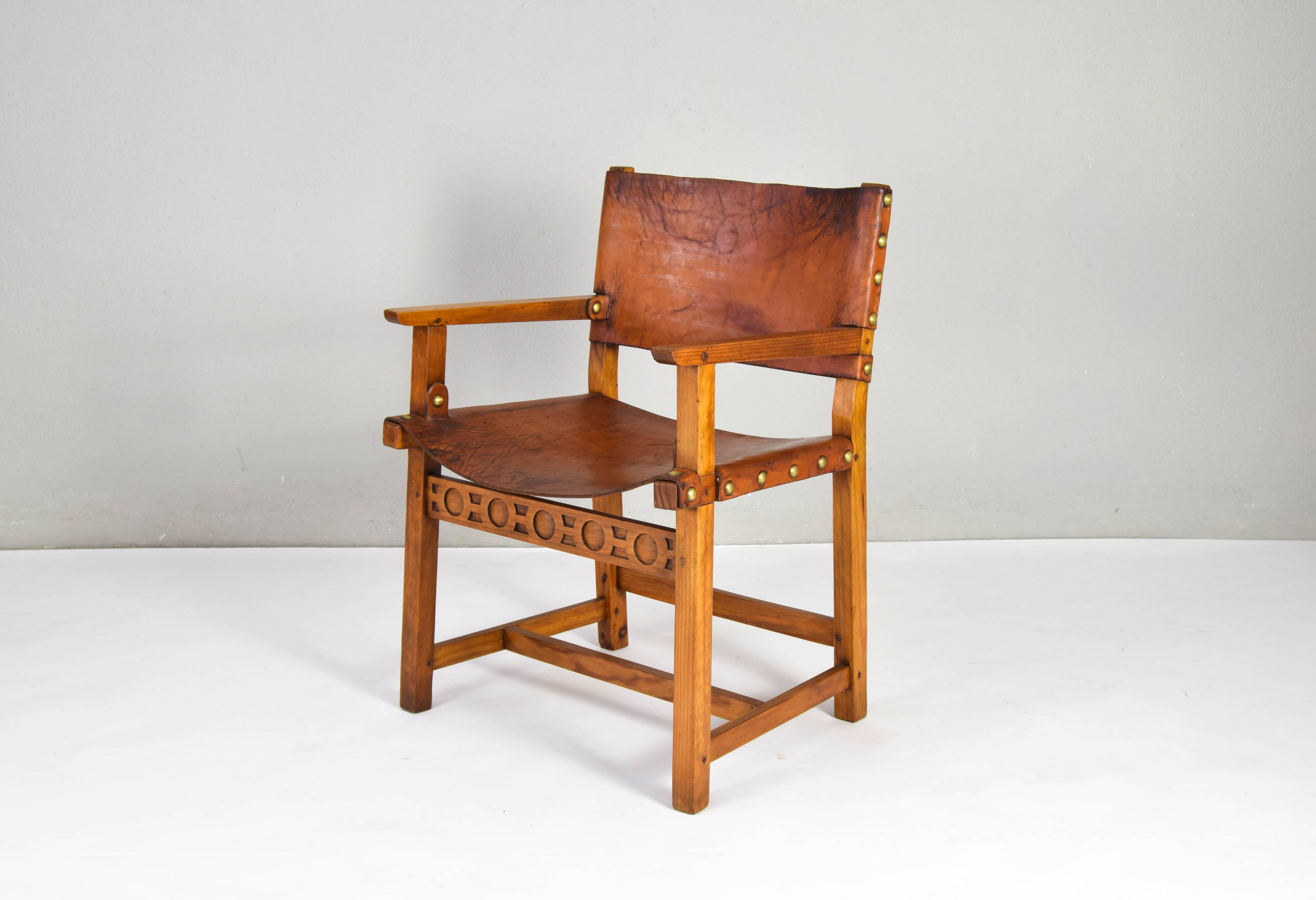 19th century oak and cognac leather brutalist castellana spanish armchair