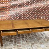 Oak community table with 8 drawers, 19th century