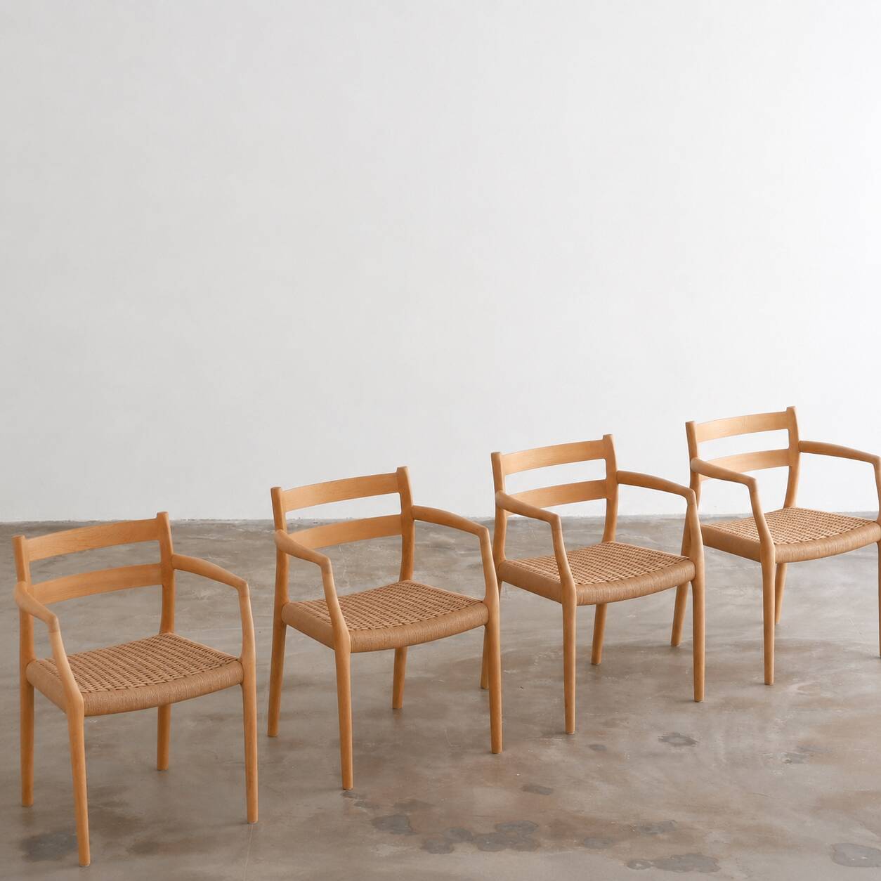 Ensemble de 4 fauteuils "Mod. 67" en chêne par Niels Moller