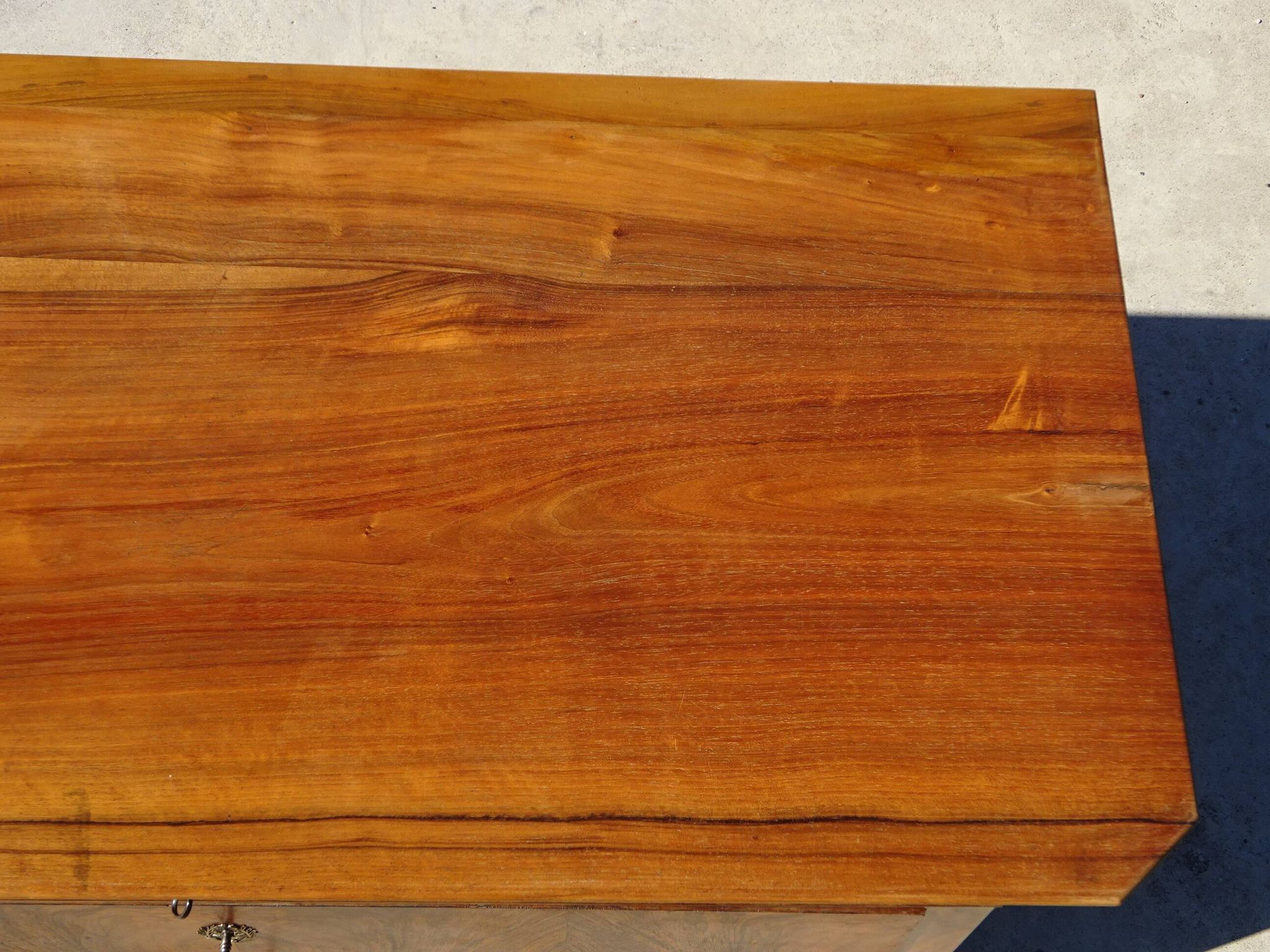 Walnut and walnut burl commode in Louis Philippe style.