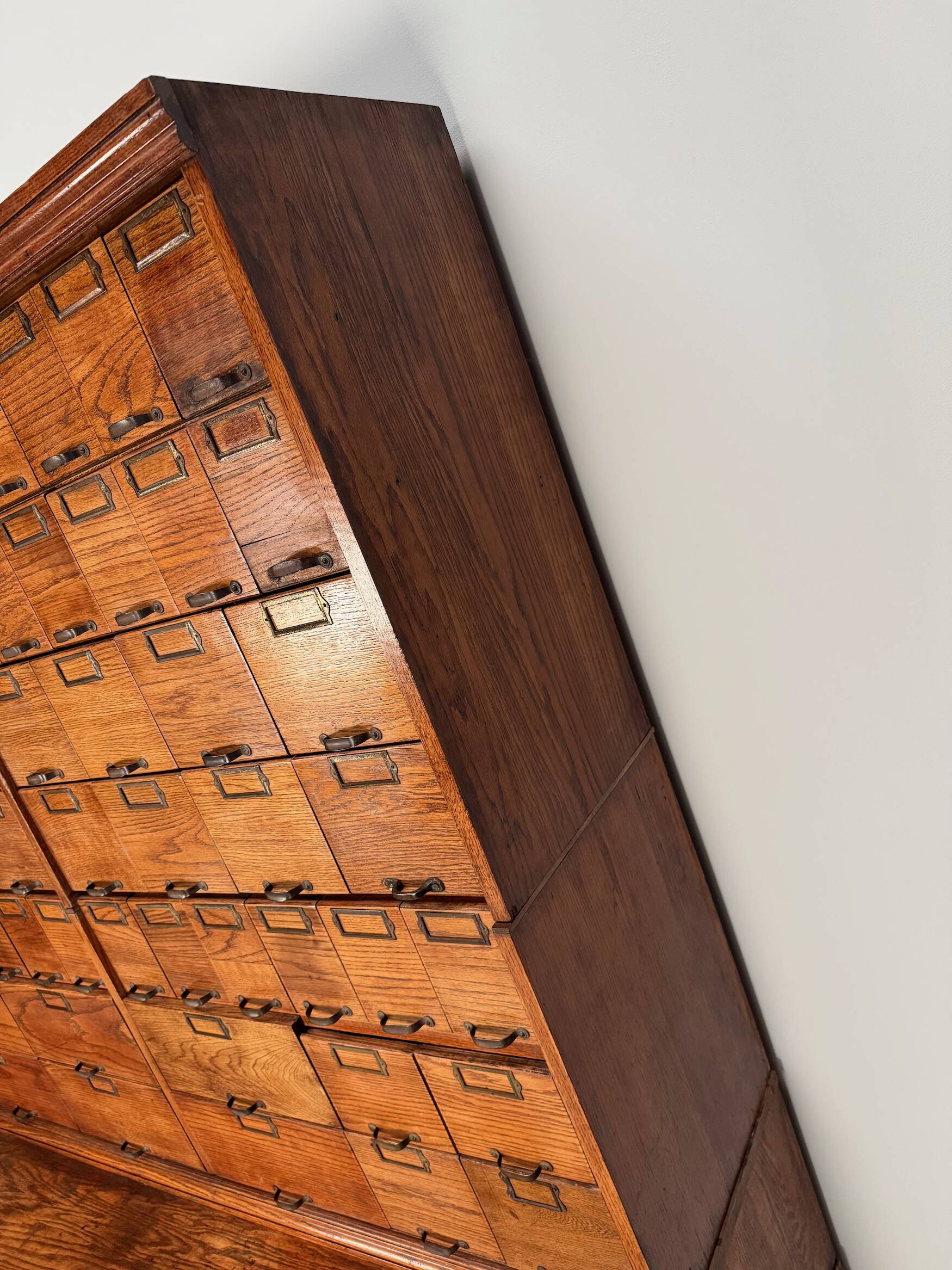 Antique very large American oak grain / apothecary cabinet, ca 1900